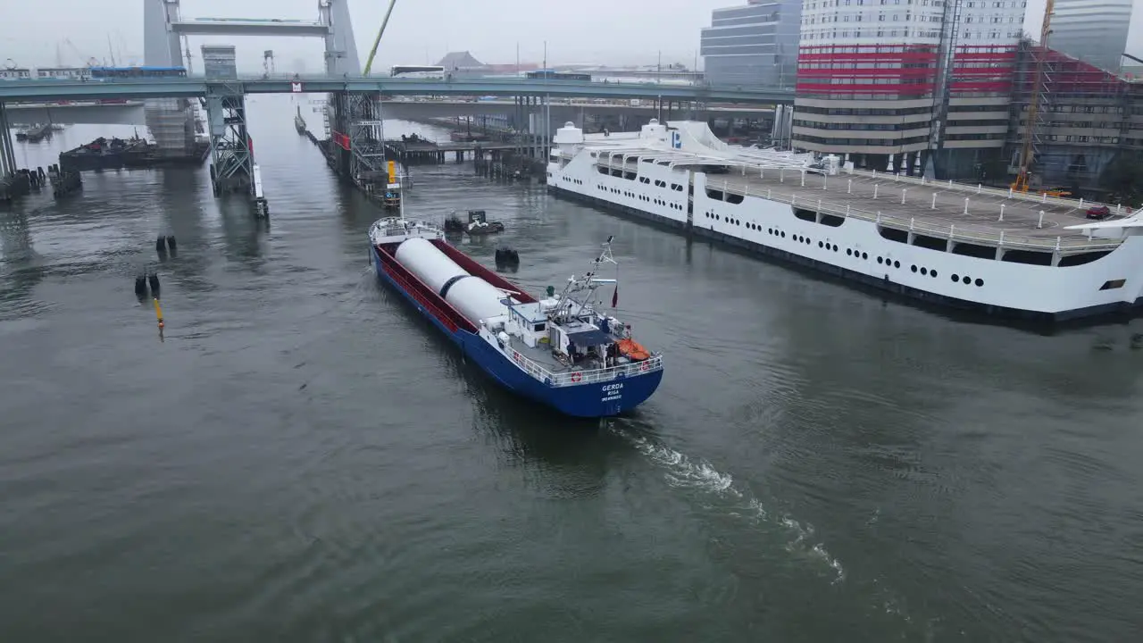 Construction Of Hisingsbron Bridge Vertical-Lift Bridge In Gothenburg Sweden Parts Being Delivered By A Cargo Ship In Gota River high angle shot