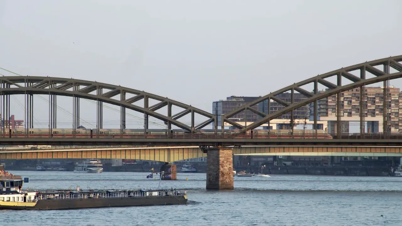 An oil gas tanker passes under the Hohenzollern Bridge in Cologne