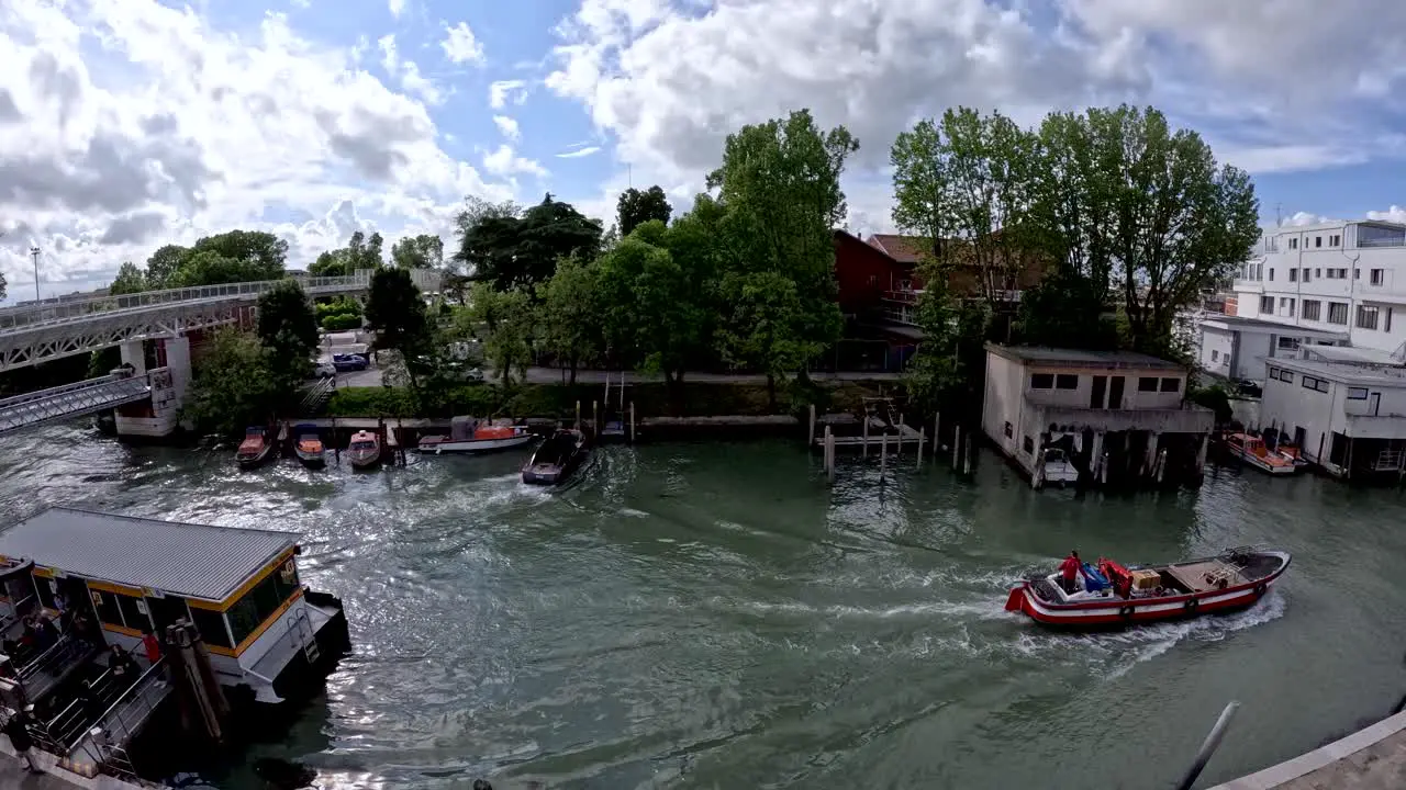 Timelapse of boats crossing Santa Chiara canal over P