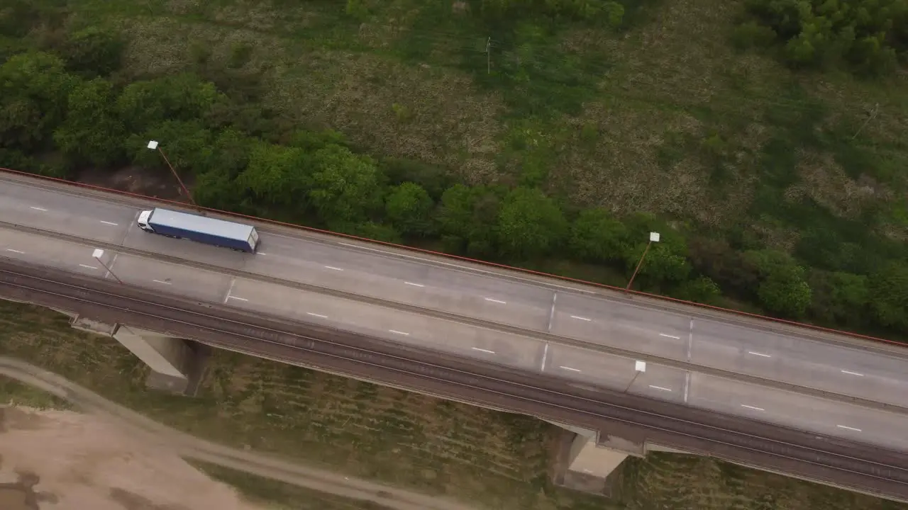 Aerial top down shot of industrial truck driving on Brazo Largo Bridges in Argentina