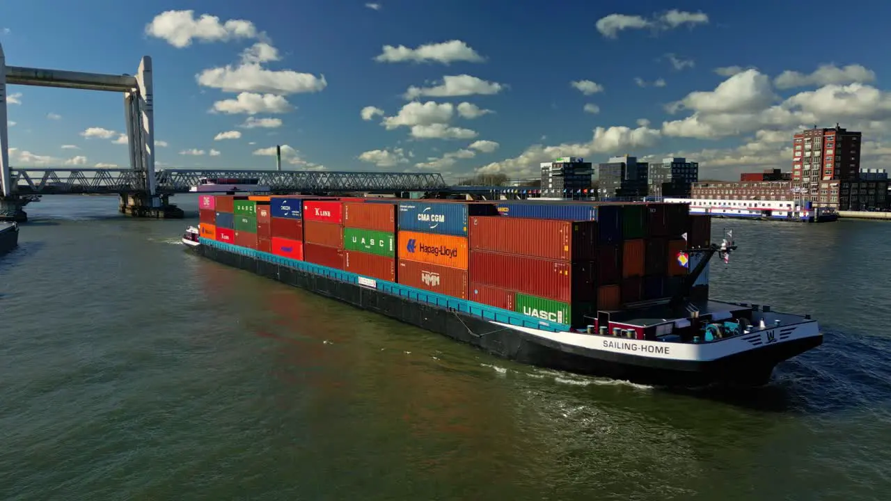 Aerial view of cargo ship navigating the canal in Dordrecht the Netherlands