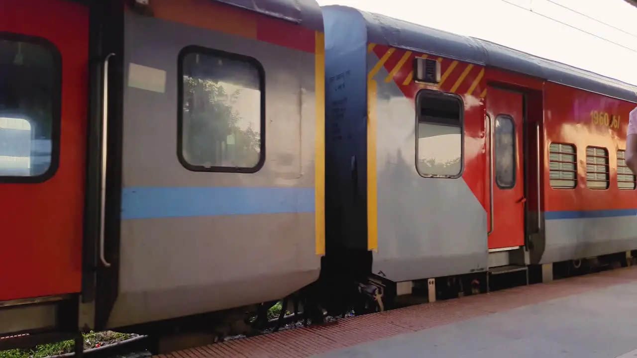 indian passenger rajdhani express train standing at station on track at evening from flat angle video is taken at kamakhya railway station assam india on May 22 2022