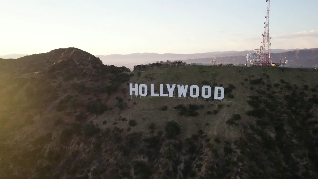 A Aerial Shot of The Hollywood Sign at Golden Hour with a Flare