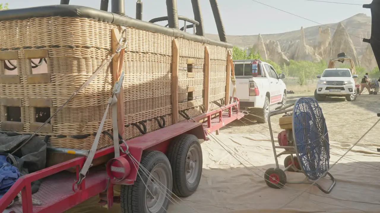 Hot air balloon passenger wickerwork basket on two axle trailer