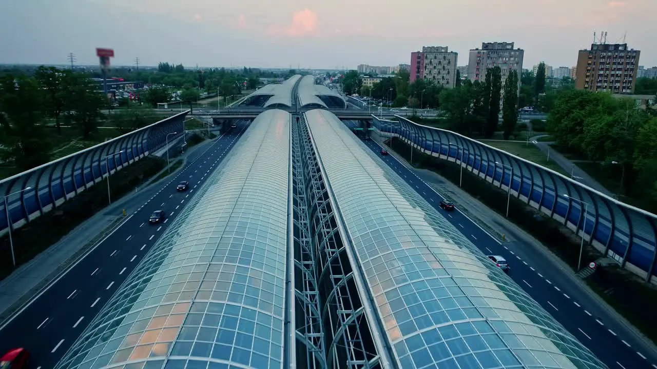 Aerial view on a glass tunnel on a motorway