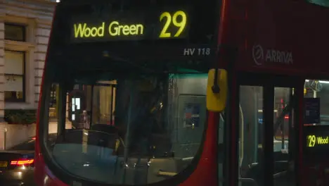 Evening Traffic With Bus On Busy London England UK Street At Dusk