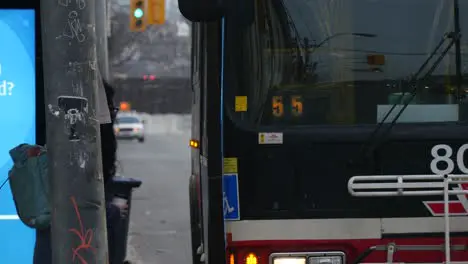 Woman Boarding Bus