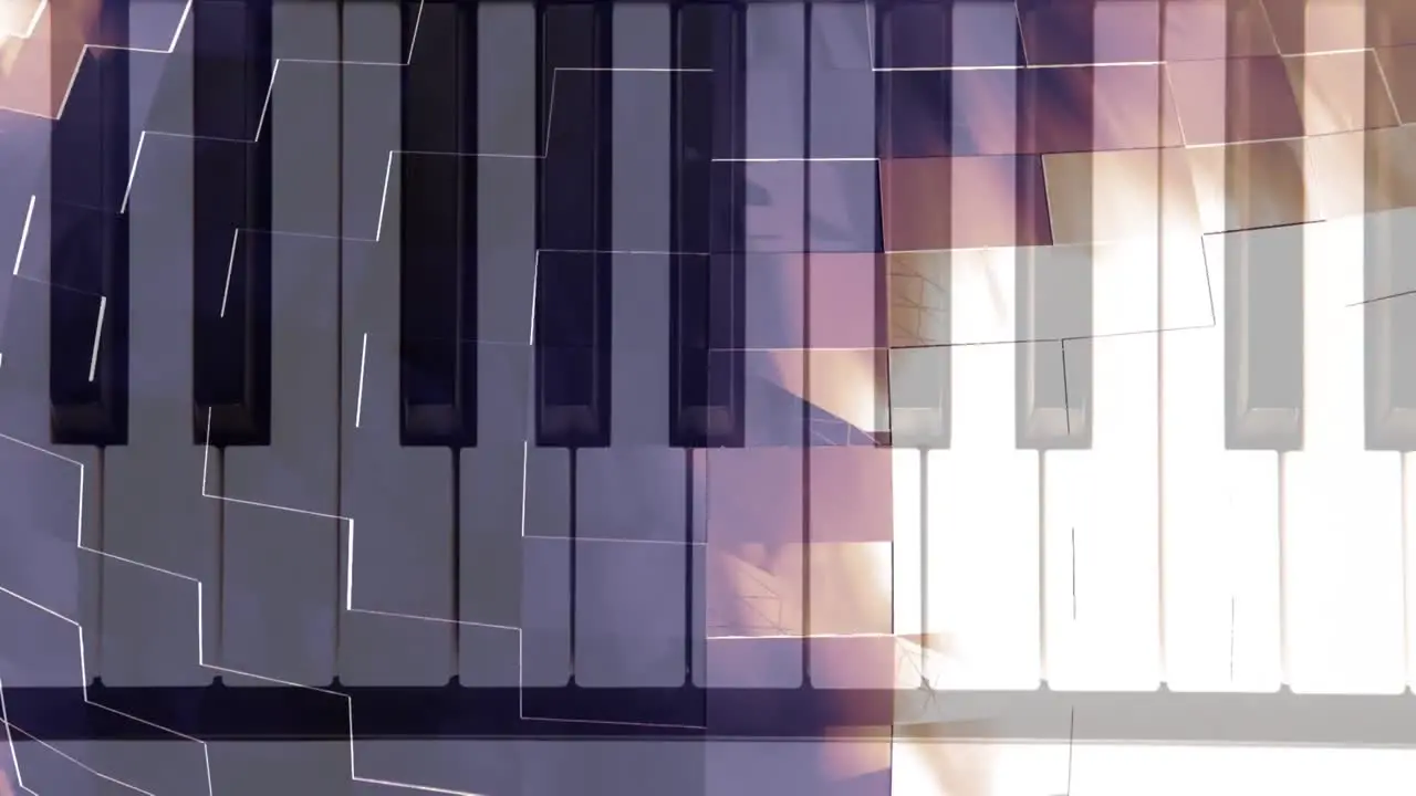 Animation of piano keyboard over mirror disco ball spinning