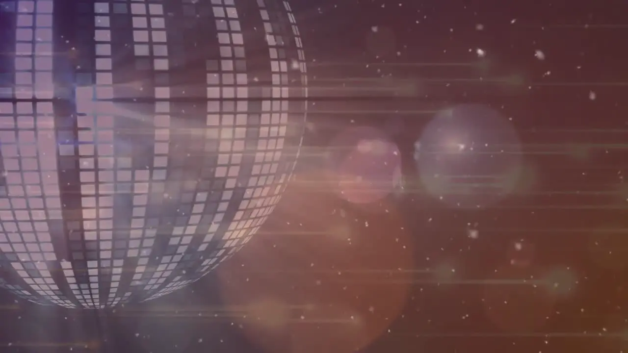 Animation of disco ball and confetti over brown background