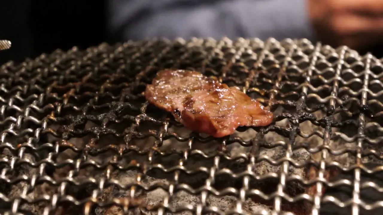 Enjoying Japanese BBQ Grilled Yakiniku at restaurant in Ikebukuro Tokyo Japan