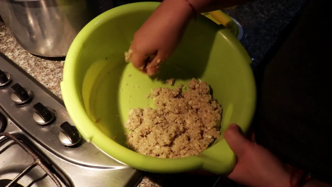 Person in the kitchen at home preparing quinoa