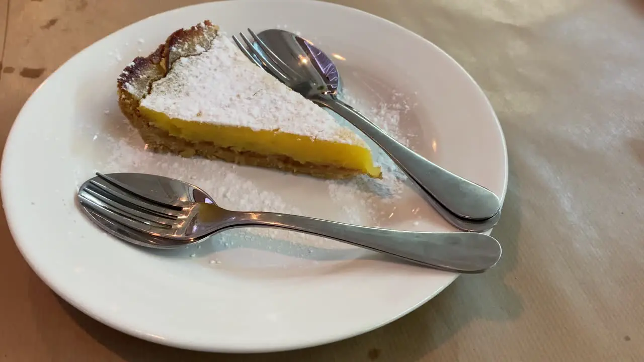 Sharing dessert between husband and wife in the mercado de Cascais