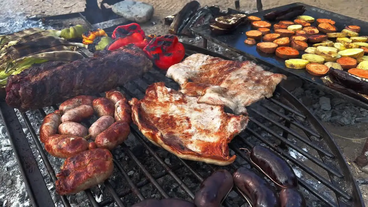 Close up of delicious grilled vegetables and meat in Argentine grill south american grilled style