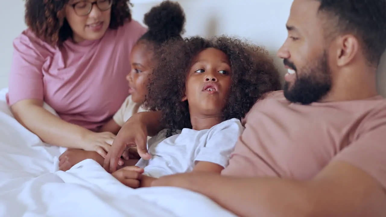 Parents children or talking in bed