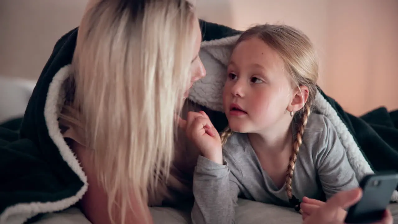 Mom girl and smile in bedroom