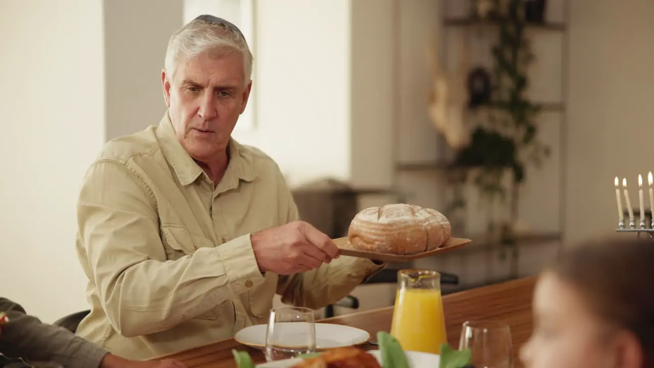 Jewish family lunch love and food with senior