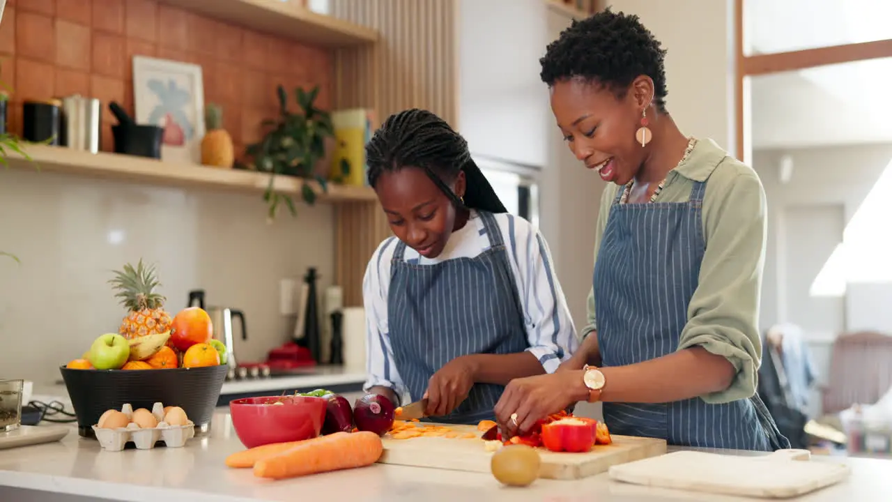 Home cooking and black family with mother