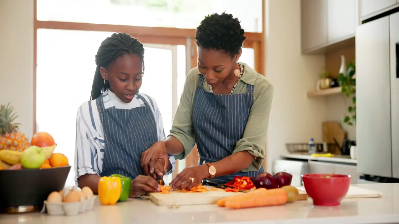 Kitchen cooking and black family with mother