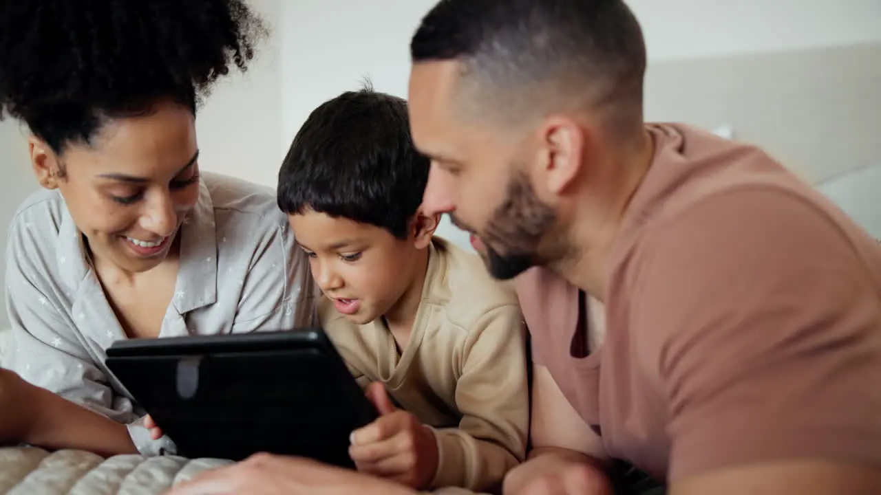 Love relax and happy family with tablet in a bed