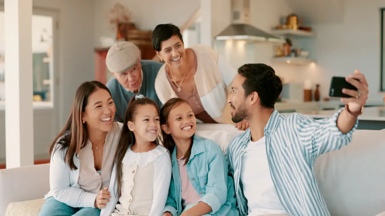 Big family children and selfie on couch in home