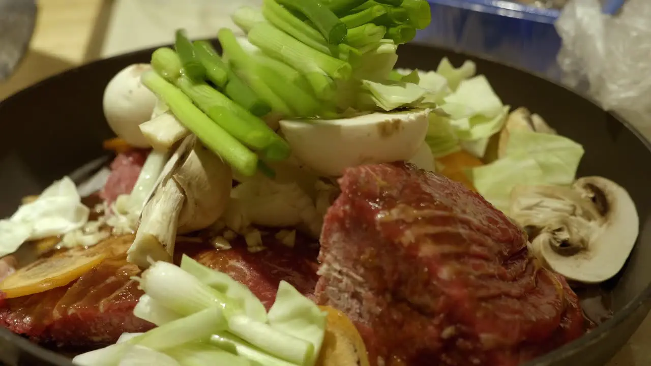 Uncooked Beef Meat With Cabbage Mushrooms And Asparagus