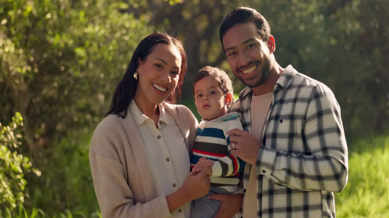 Face happy family and pointing in nature