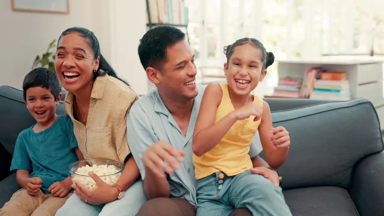 Happiness parents and kids watching tv