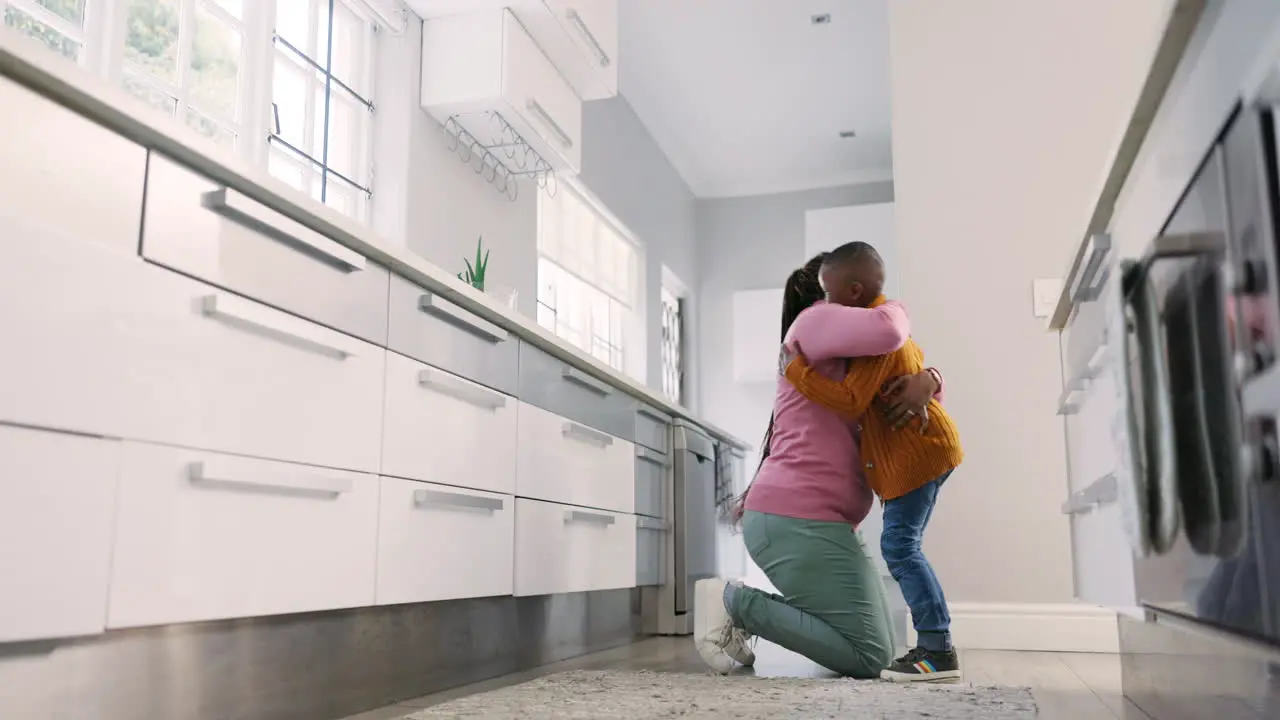 Hug kitchen and black family child