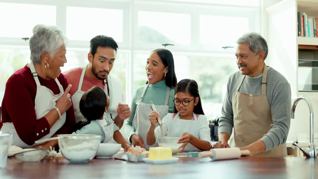 Happy kitchen and big family baking together