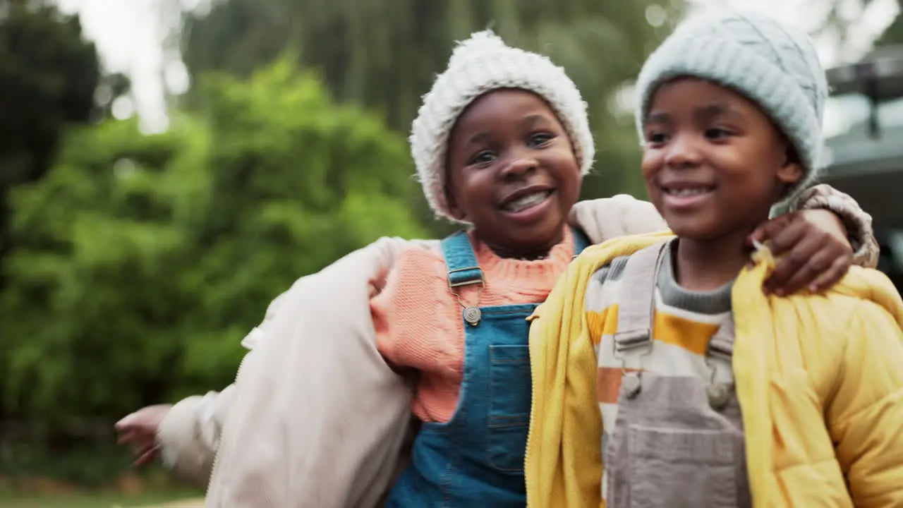 Black family kids and hug with boys outdoor