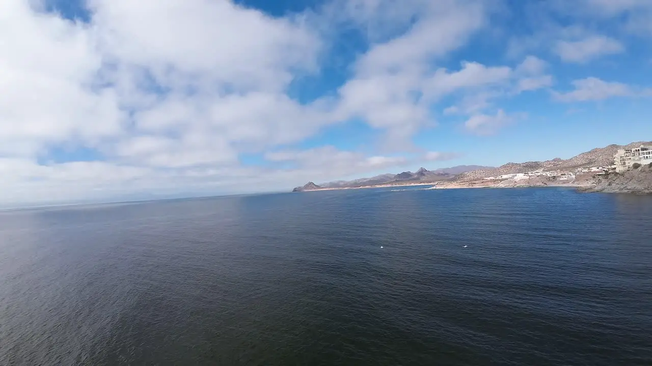 drone flies over a vast sea