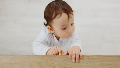 Top view baby girl or curious child in house