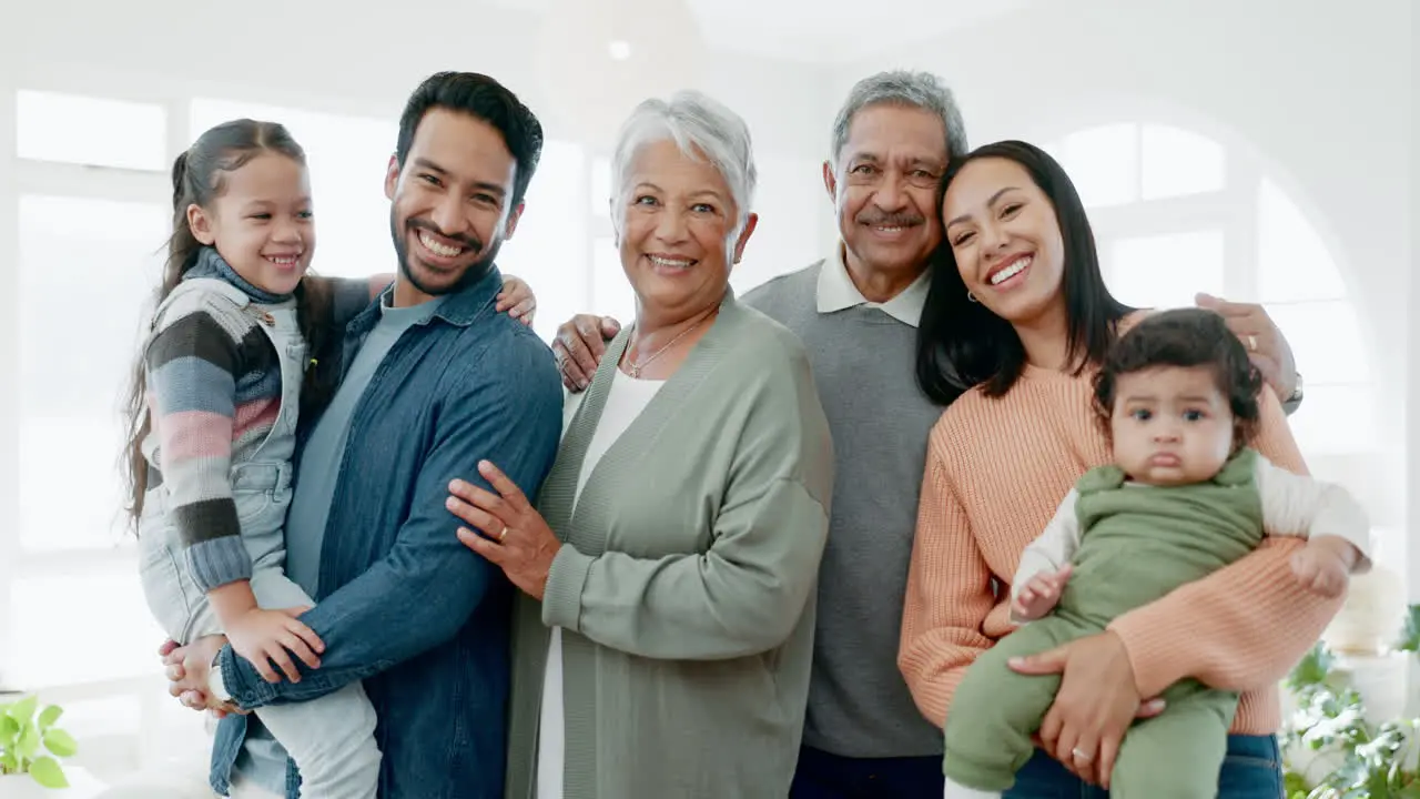 Children grandparents and family portrait at home