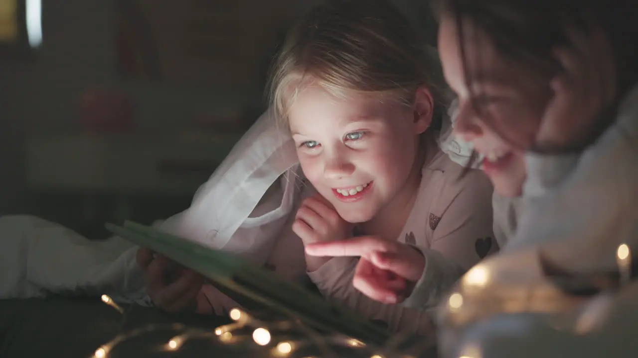 Tablet night and search with children in bedroom