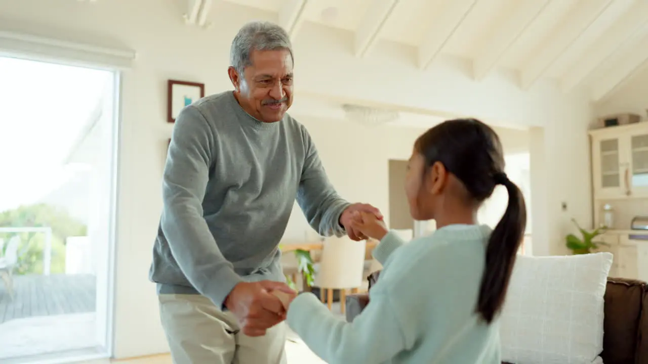 Parents kids and grandparents in living room