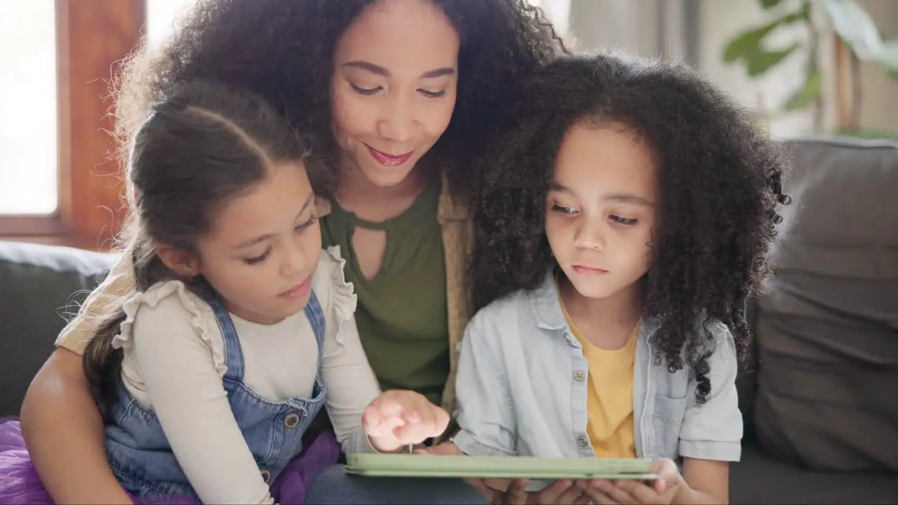 Mother children and tablet on sofa with care