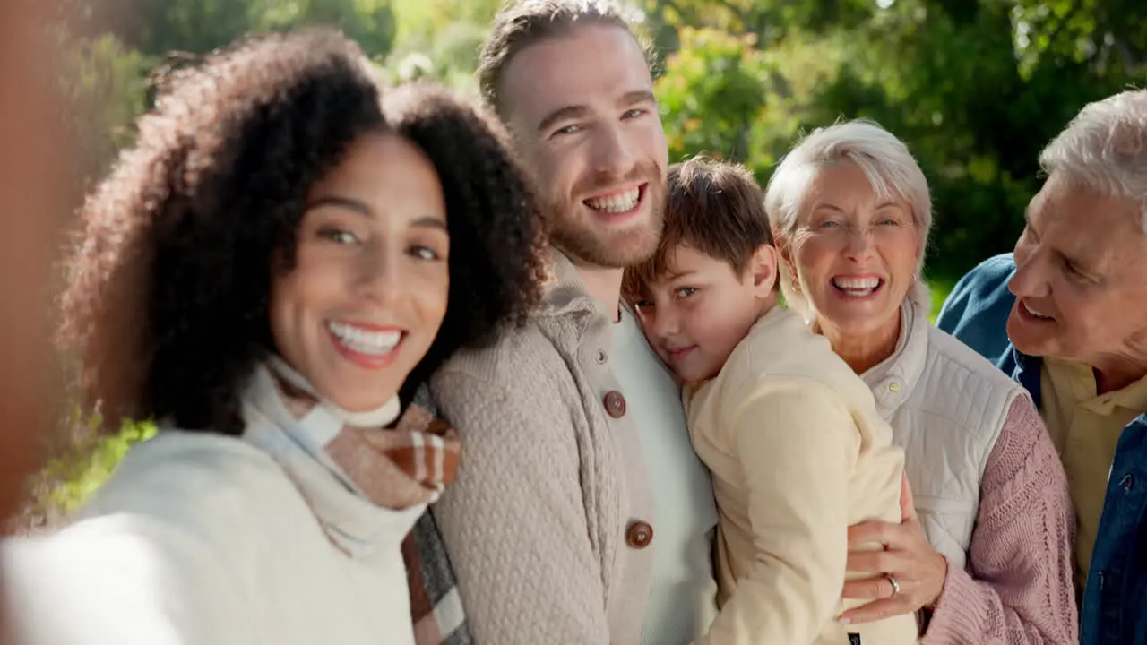 Selfie face and a big family laughing in nature