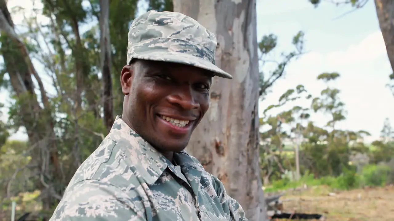 Portrait of military soldier standing with arms crossed