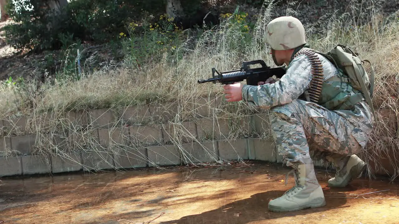 Military soldier during training exercise with weapon