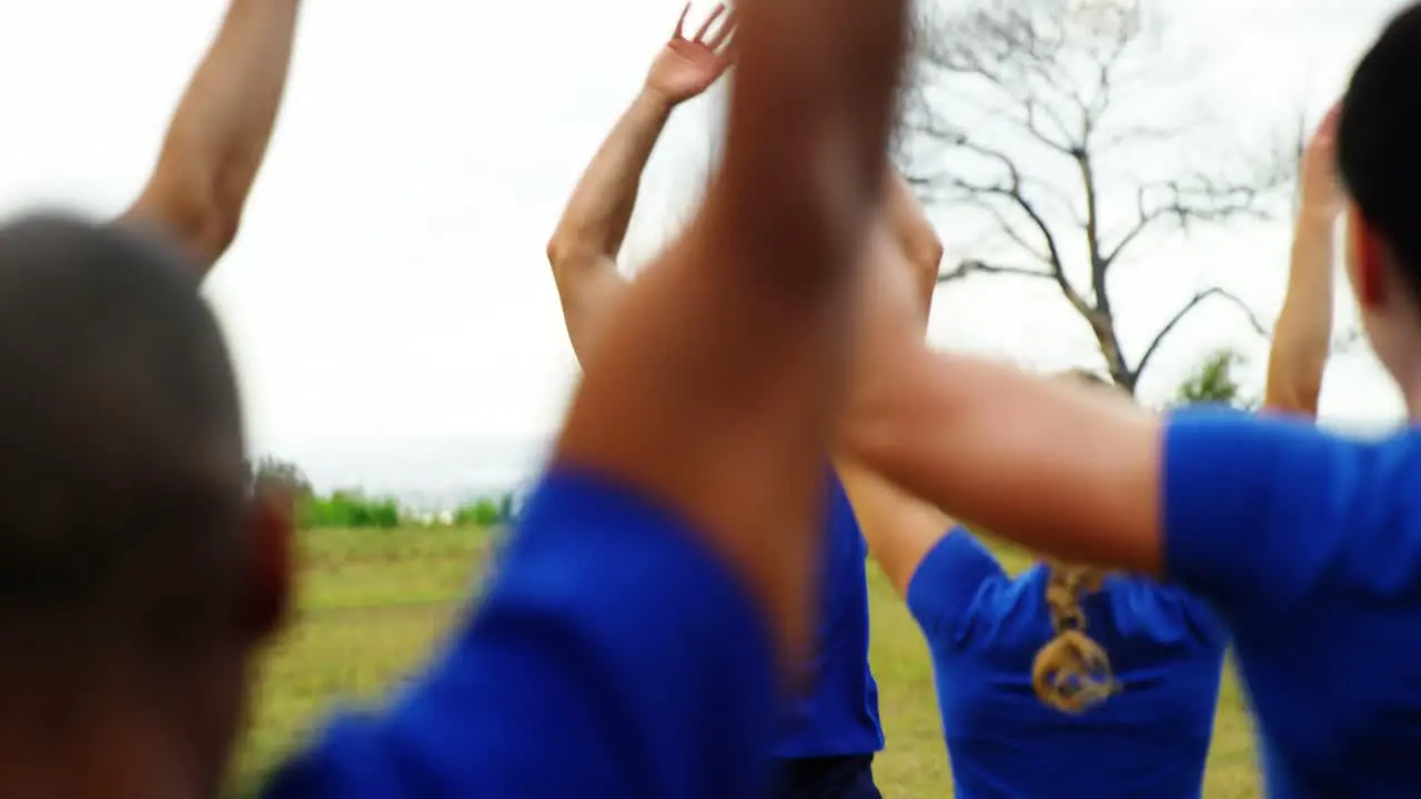 Fit people performing stretching exercise 4k