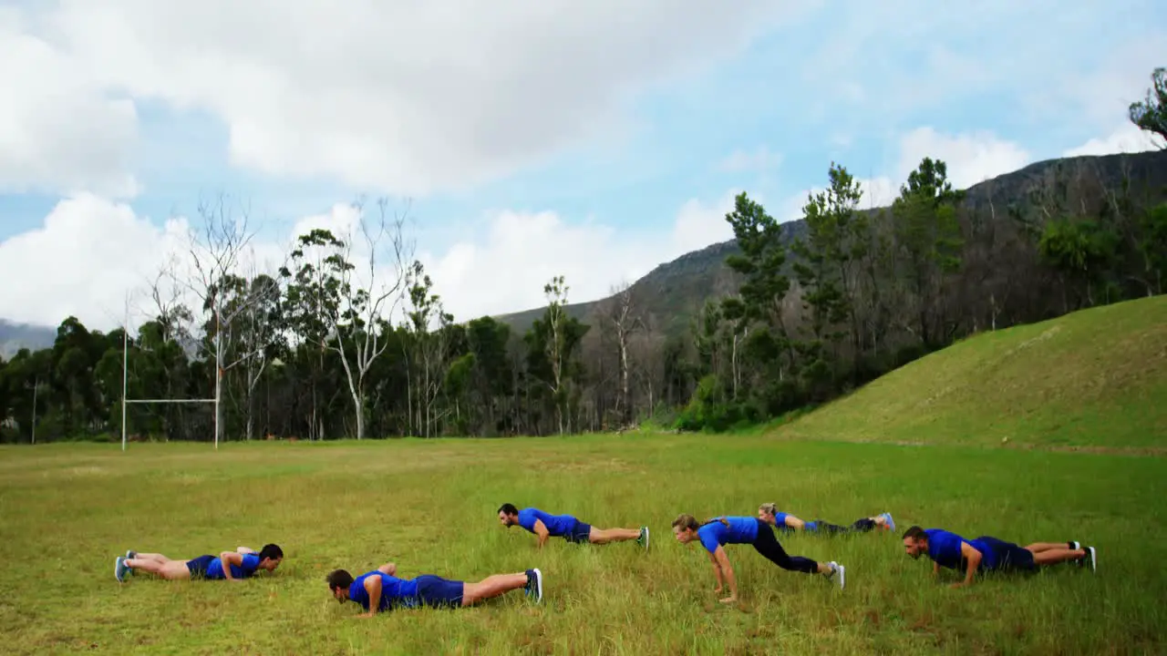 Fit people performing pushup exercise 4k