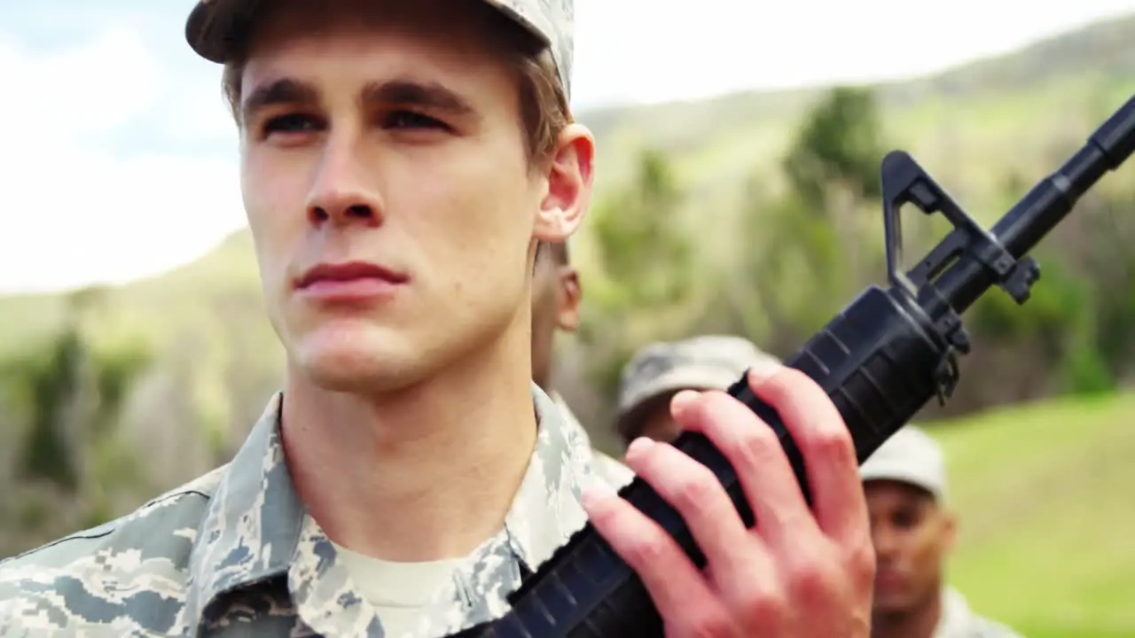 Group of military soldiers standing with rifles 4k