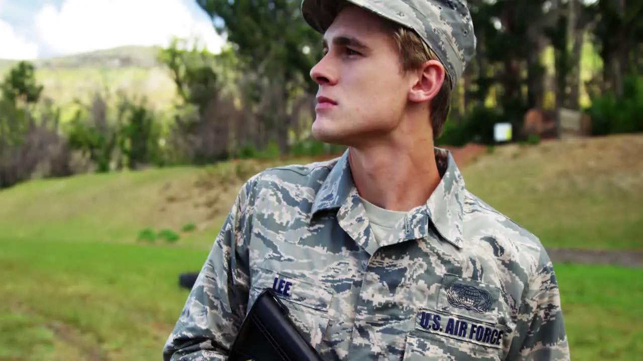 Air force soldier guarding with a rifle 4k