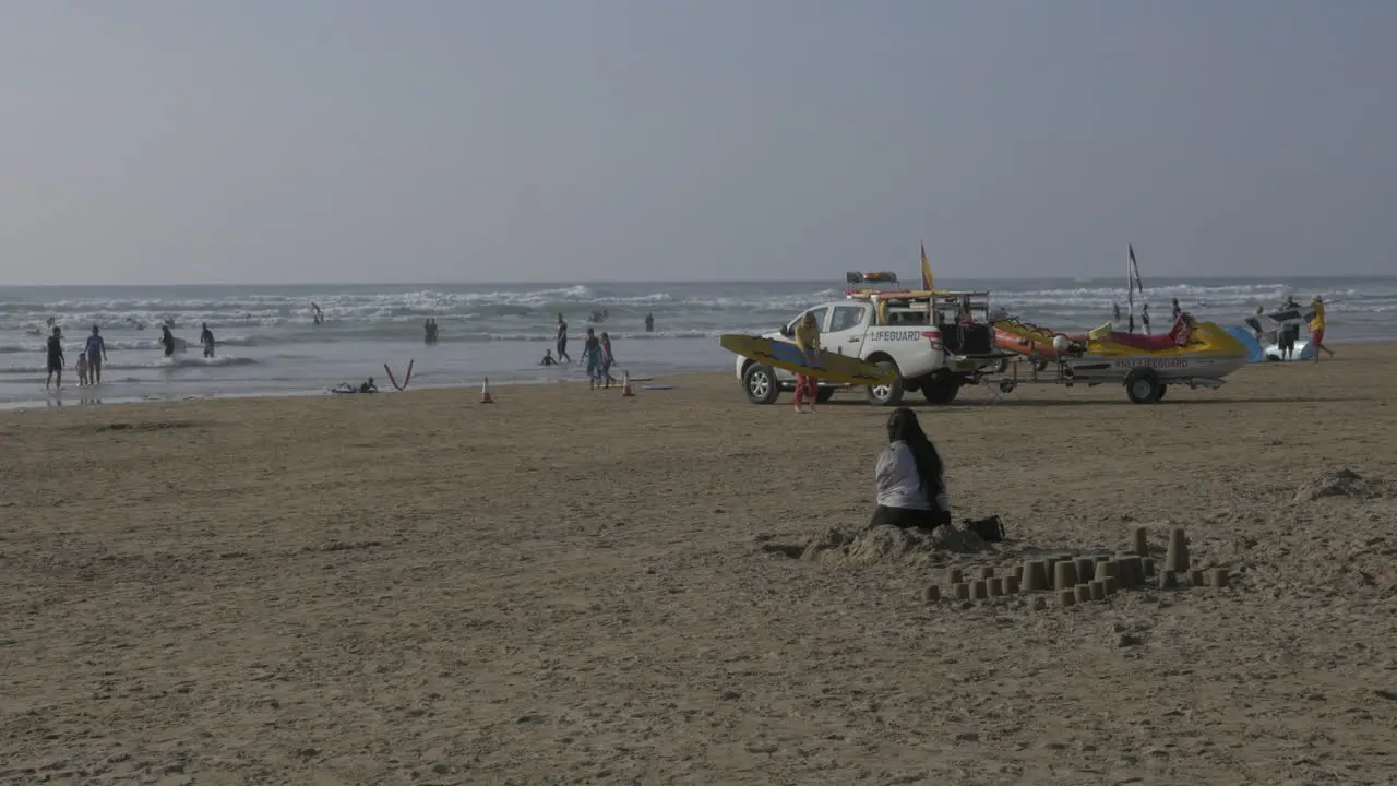 Watching the lifeguards packing up from a busy weekend at the beach