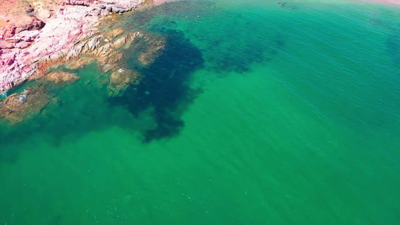 Aerial flight over colorful beach