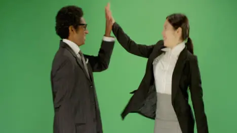 Man and Woman in Suits Hi Five