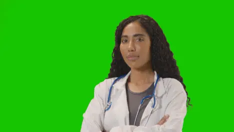 Portrait Of Female Doctor In White Lab Coat With Stethoscope Against Green Screen 4