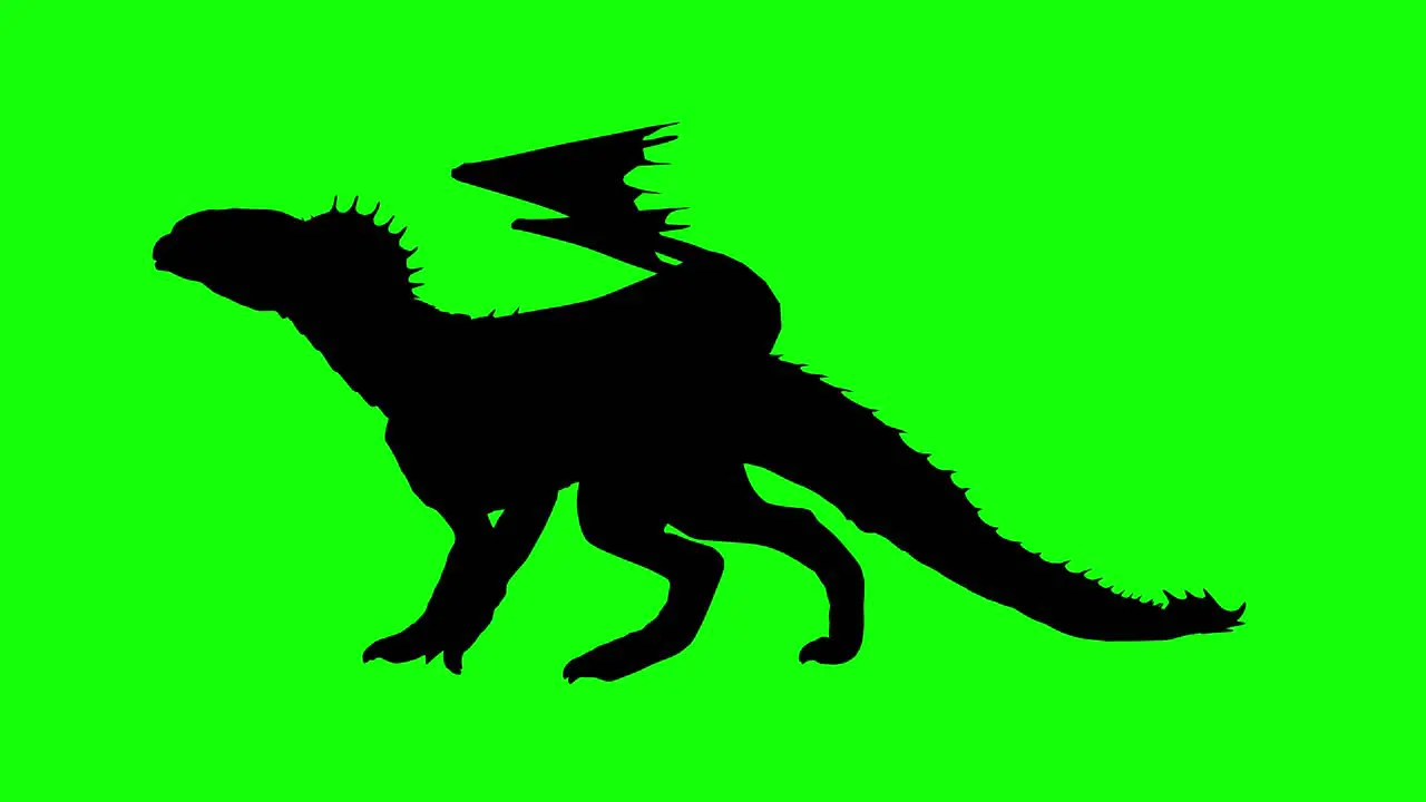 Silhouette of a fantasy creature monster dragon walking on green screen side view