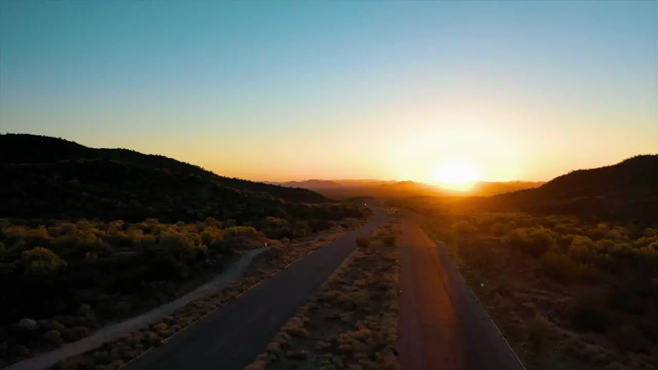 Walking on the road towards the sun