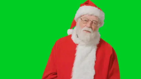 Portrait Shot of Santa Looking to Camera with Green Screen